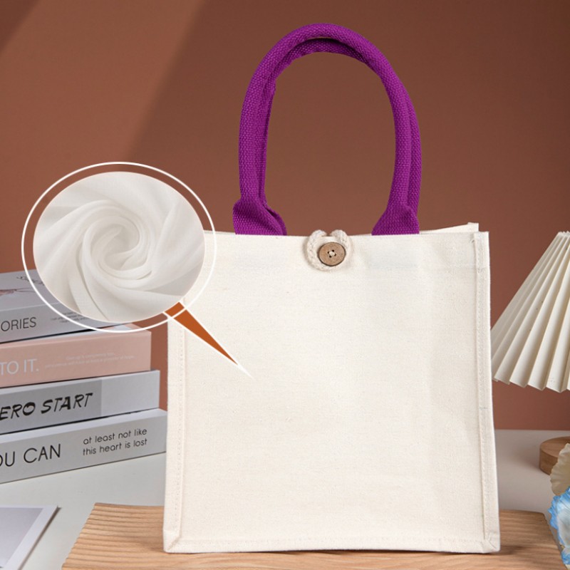 Borsa tote in tela con manico a contrasto e bottone in legno