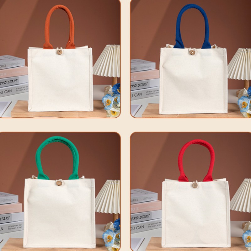 Borsa tote in tela con manico a contrasto e bottone in legno