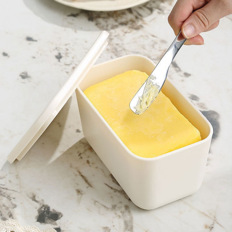 Piatto per burro con coperchio e spargitore Piatto per burro con coperchio e spargitore