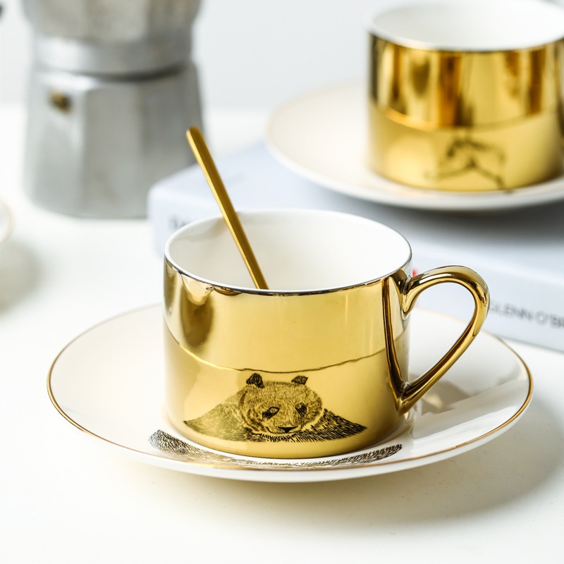 Set tazza e piattino in ceramica con riflesso a specchio